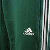 Spodnie dresowe męskie Adidas Essentials French Terry zielone 3-Stripes - IS1392